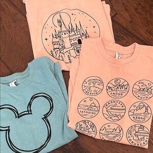 Disney / Universal Shirts Kids Short Sleeve Tees in Peach and Light Blue